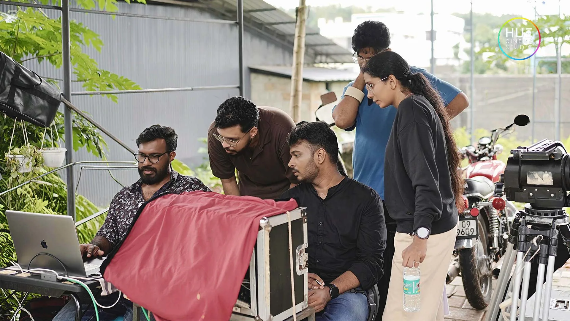 Hue Cinema Studio LLP film crew with director Haran Reddi working together during behind the scenes of ad film production.