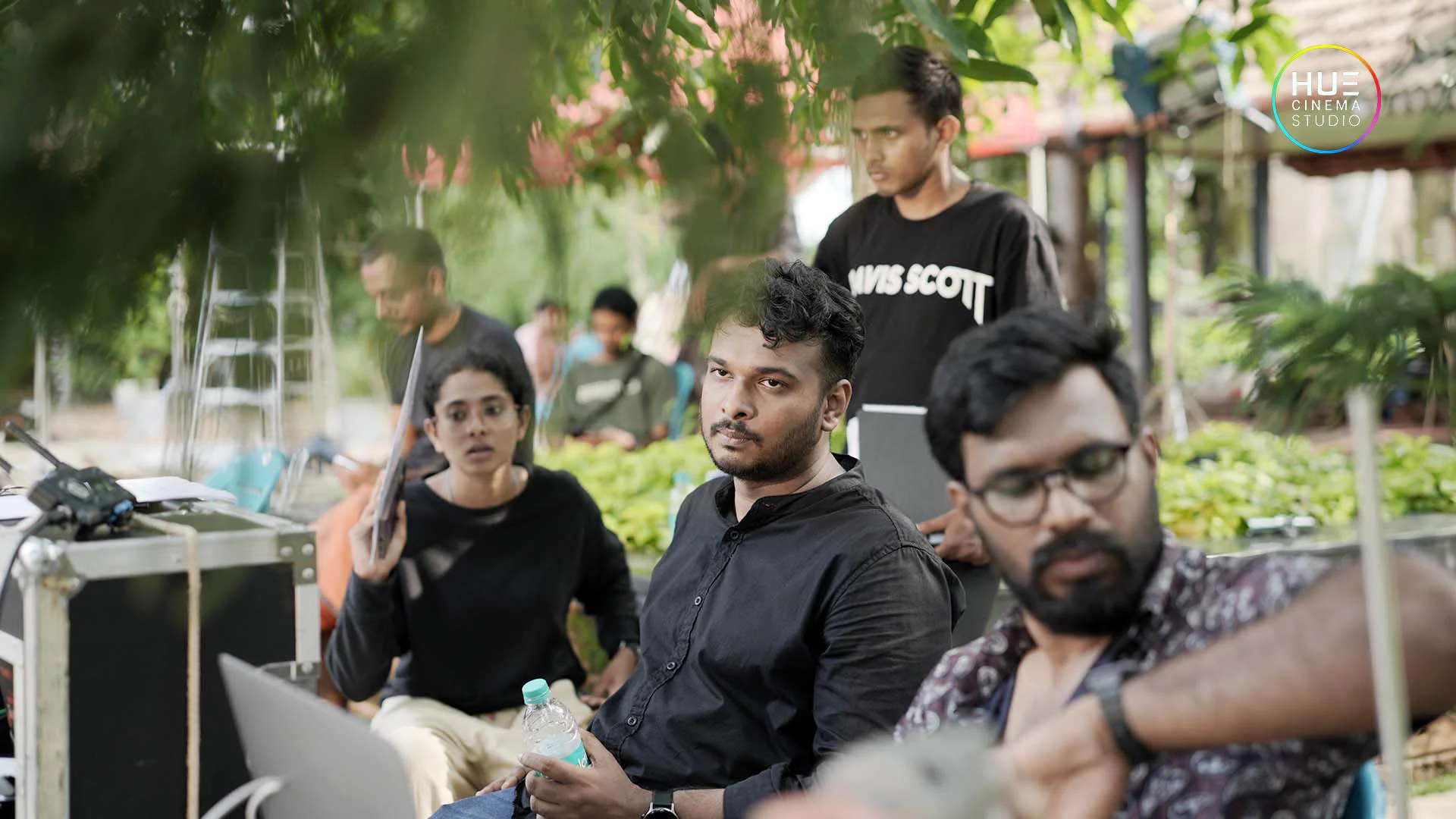 Haran Reddi monitoring shots during ad film production at Hue Cinema Studio LLP.