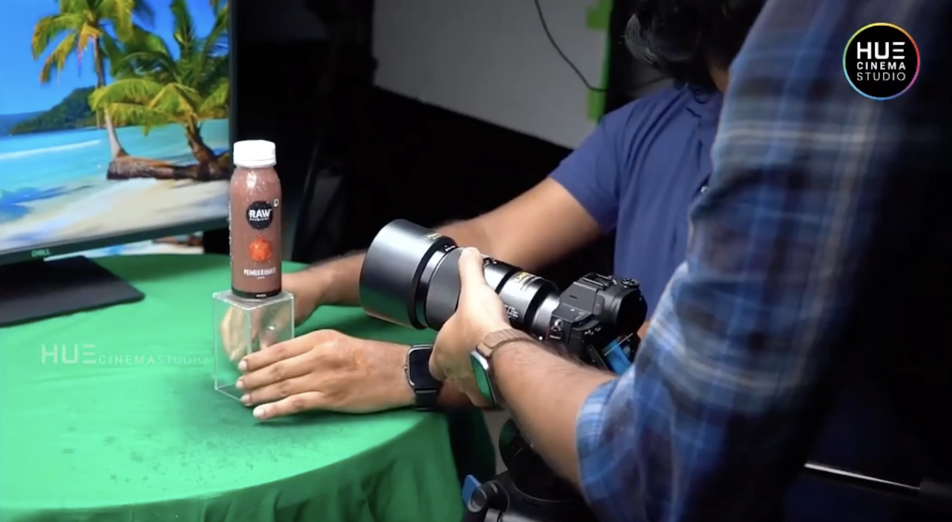 Camera setup with a Sony Alpha for a close-up shot of a RAW pomegranate juice bottle during the Alkor Cyber Space b-roll shoot, Hue Cinema Studio.