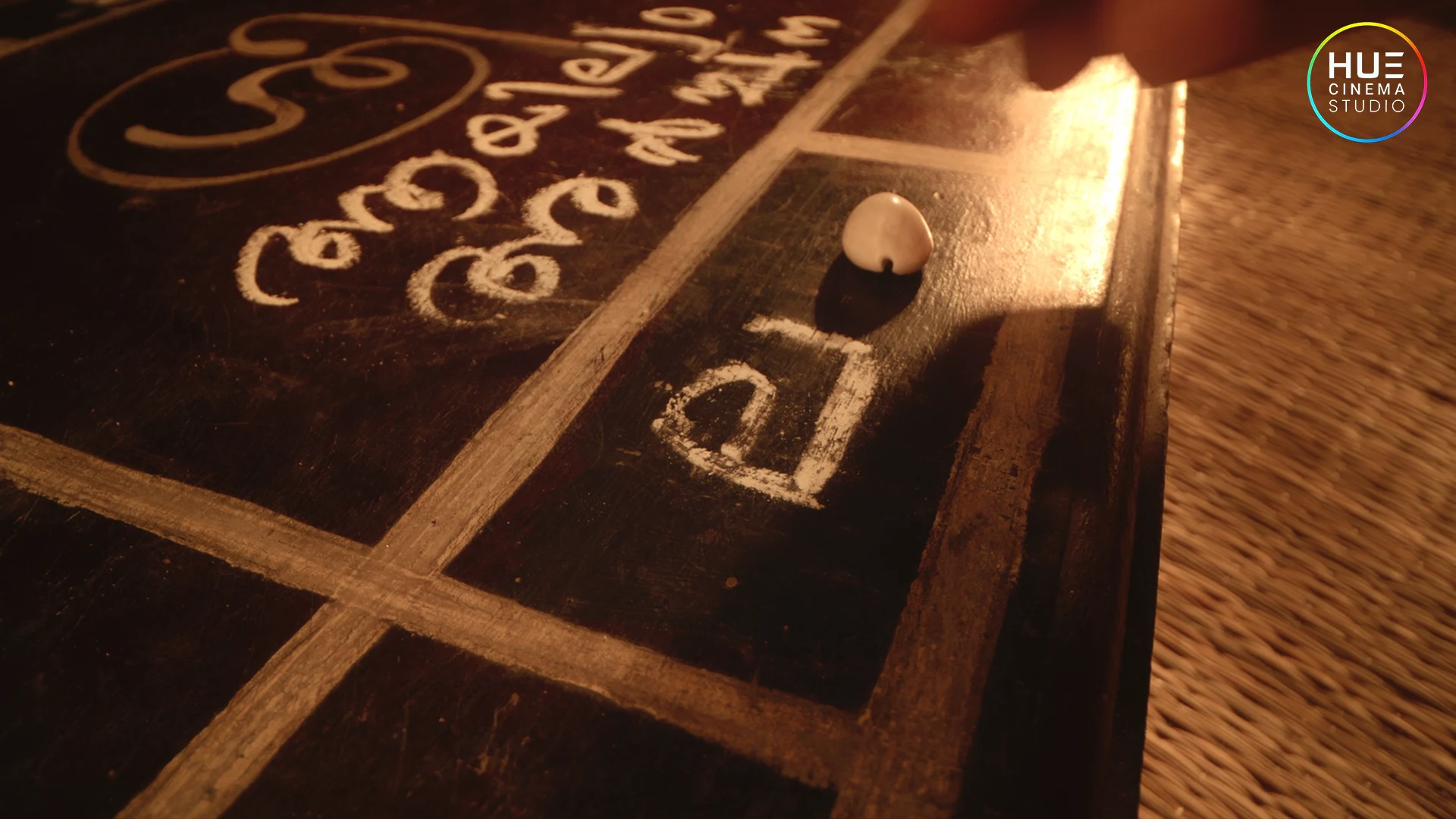 Kavadi Palaka and cowrie shells, traditional Kerala astrology tools featured in Jolsiyan, an ad film by Hue Cinema Studio, directed by Haran Reddi.