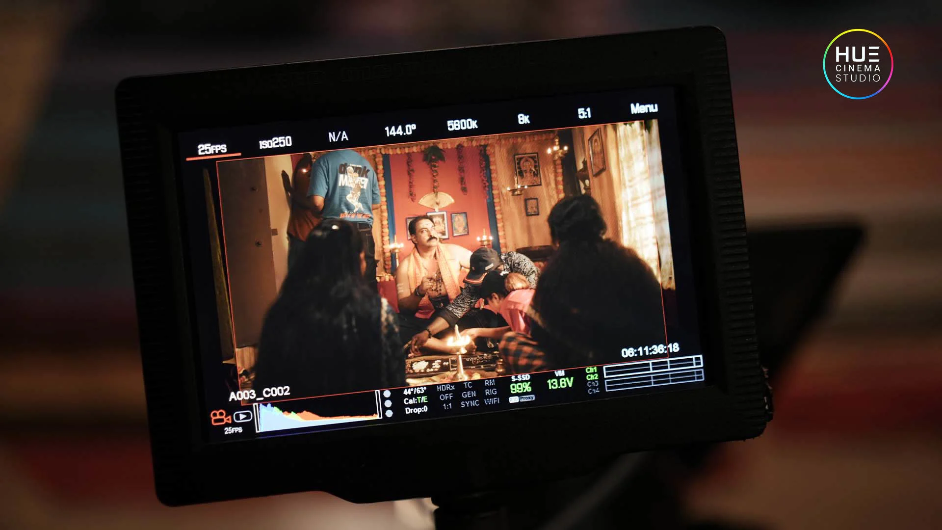 Actor Sanju Nedumkunnen framed through the camera monitor during scene setup on the Jolsiyan ad film shoot, Hue Cinema Studio.